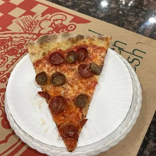Pepperoni and sausage slice