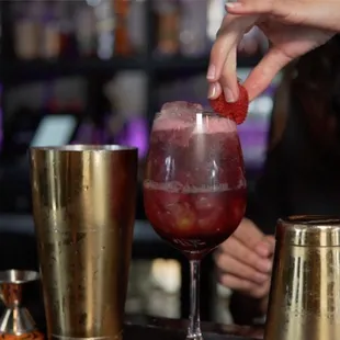 a bartender making a cocktail