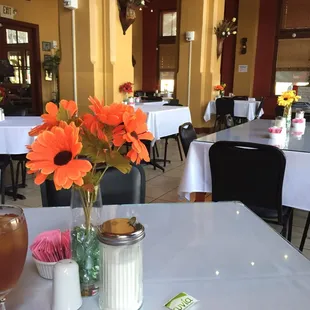 Dining room. Lots of wood, pretty old school interior, quaint and clean, real linen tablecloths and cloth napkins