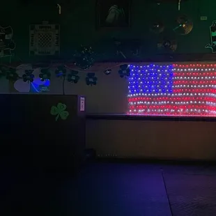 a neon american flag on the wall