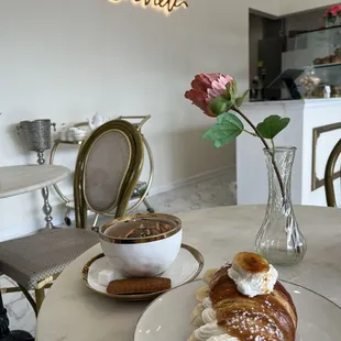 Blue Lady Black Tea and banana and peanut butter cream filled croissant.