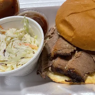 Brisket sandwich with side of coleslaw, and because I love spicy the barbecue sauce was a perfectly match. Buns were fresh.
