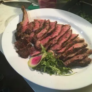 36 ounce, 65 days dry aged bone in rib eye