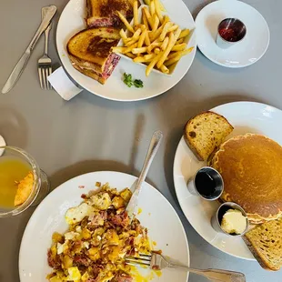 Corned beef hash, sweet cream pancakes, Ruben with fries.. and a apple cider mimosa.