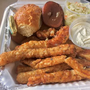 Italian Breaded Fried Cod Dinner with an added half portion with cottage fries vinaigrette coleslaw, roll, butter &amp; tartar sauce