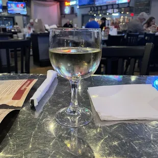Glass of house Chardonnay