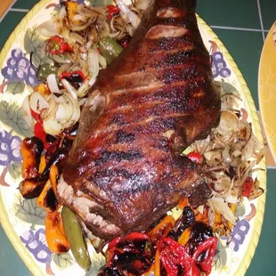 Leg of Lamb with fire roasted peppers and onions