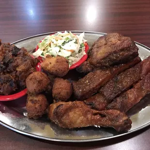 Pork ribs and chicken combo. Sweet potato and cole slaw
