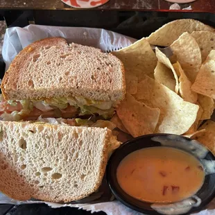 Pastrami on Rye with sweet mustard and a side of Chips and Queso.