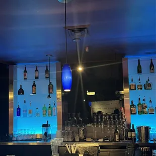 ows a bar with blue lights
