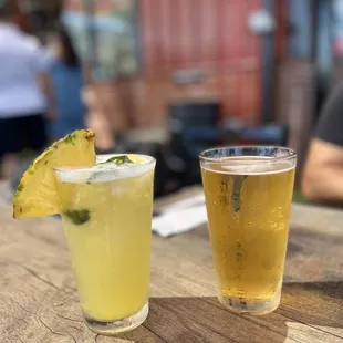 a pineapple drink and a pineapple drink