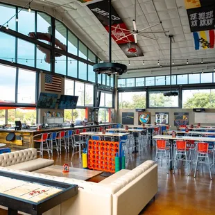 Covered, climate controlled patio with a bar