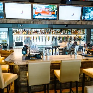 Bar top seating with the perfect view of our TVs showing music videos and live sports