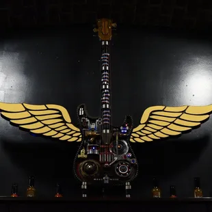 a guitar with wings