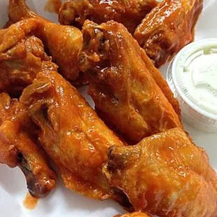WINGS! Authentic Buffalo New York Style. Available in hot, medium, mild, lemon pepper, BBQ, mango habanero, or teriyaki
