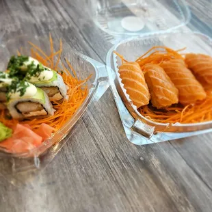 two containers of sushi