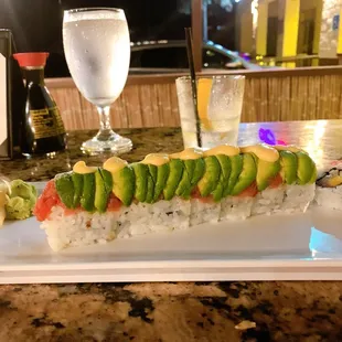 a sushi roll with avocado