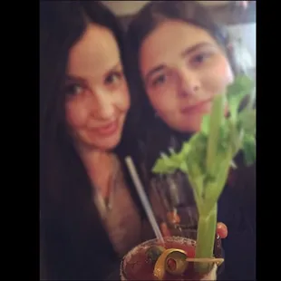 Moni and I enjoying our drinks on a Monday night. Girlfriends since elementary school .