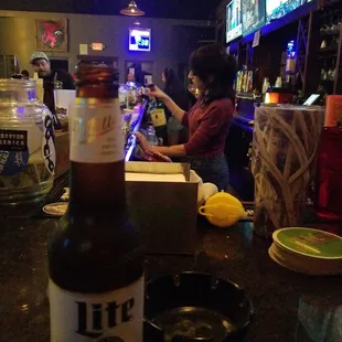 a woman at the bar