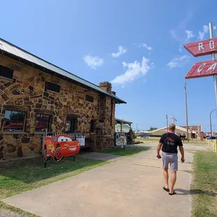 In front and along the road