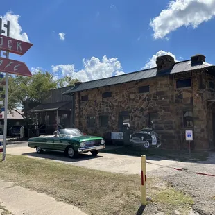 Despite being told NOT to park in front of the building, we stopped for a quick photo and left before we were told not to (again).