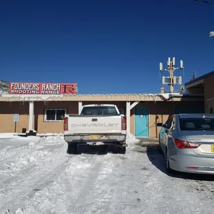 a truck parked in front of a building
