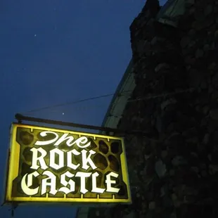 neon sign for rock castle