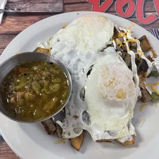 Huevos Rancheros with sauce on the side but wasn&apos;t too spicy! It was amazing!