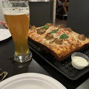 Sausage deep dish pizza Hefeweizen beer