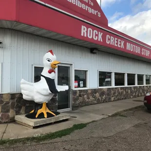 The big chicken is here to greet you.
