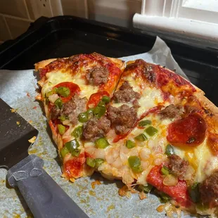 Our large pepperoni and sausage pizza