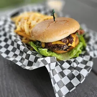The "Rockhouse Burger" with fries. Small patty.