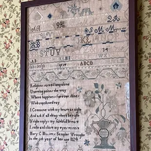 Sampler in master bedroom at the  Rock Ledge House.