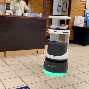 a robot in a restaurant