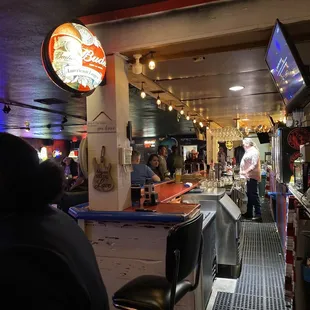  man standing at the bar