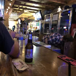  man sitting at a bar