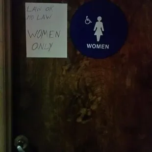  women only sign on a door