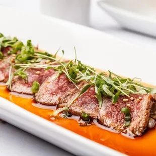 ows a piece of steak on a plate