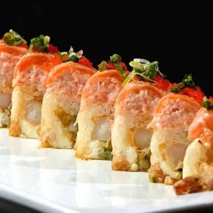 ows a close up of a roll of sushi