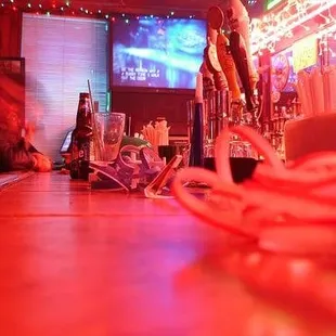 a bar with a television in the background