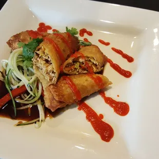 Chicken Siracha Egg Rolls w sesame cucumber salad. (limited run)