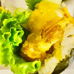 Their Signature Maki=The Rock and Roll Maki
 Shrimp and calamari tempura, lettuce, cilantro, cucumber and spicy mayo.