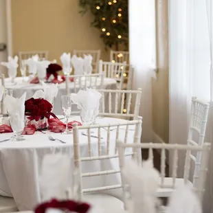 Back seating area with round tables.