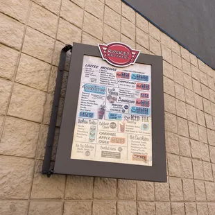 a sign on the side of a building