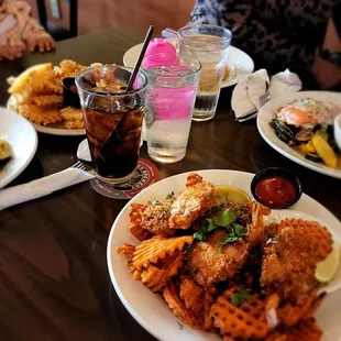 a table full of food and drinks