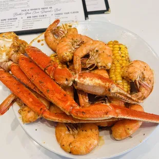 Crab and shrimp platter with corn  on the cob and potato's drenched in the All-In spice. So good!!
