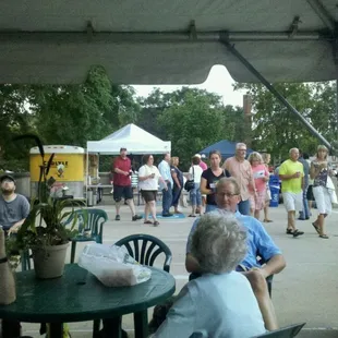 a group of people sitting around a table