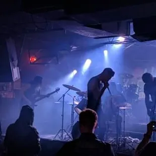 a band performing on stage