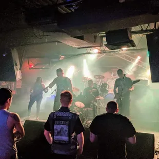 a band performing on stage