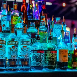 bottles of alcohol on a bar counter